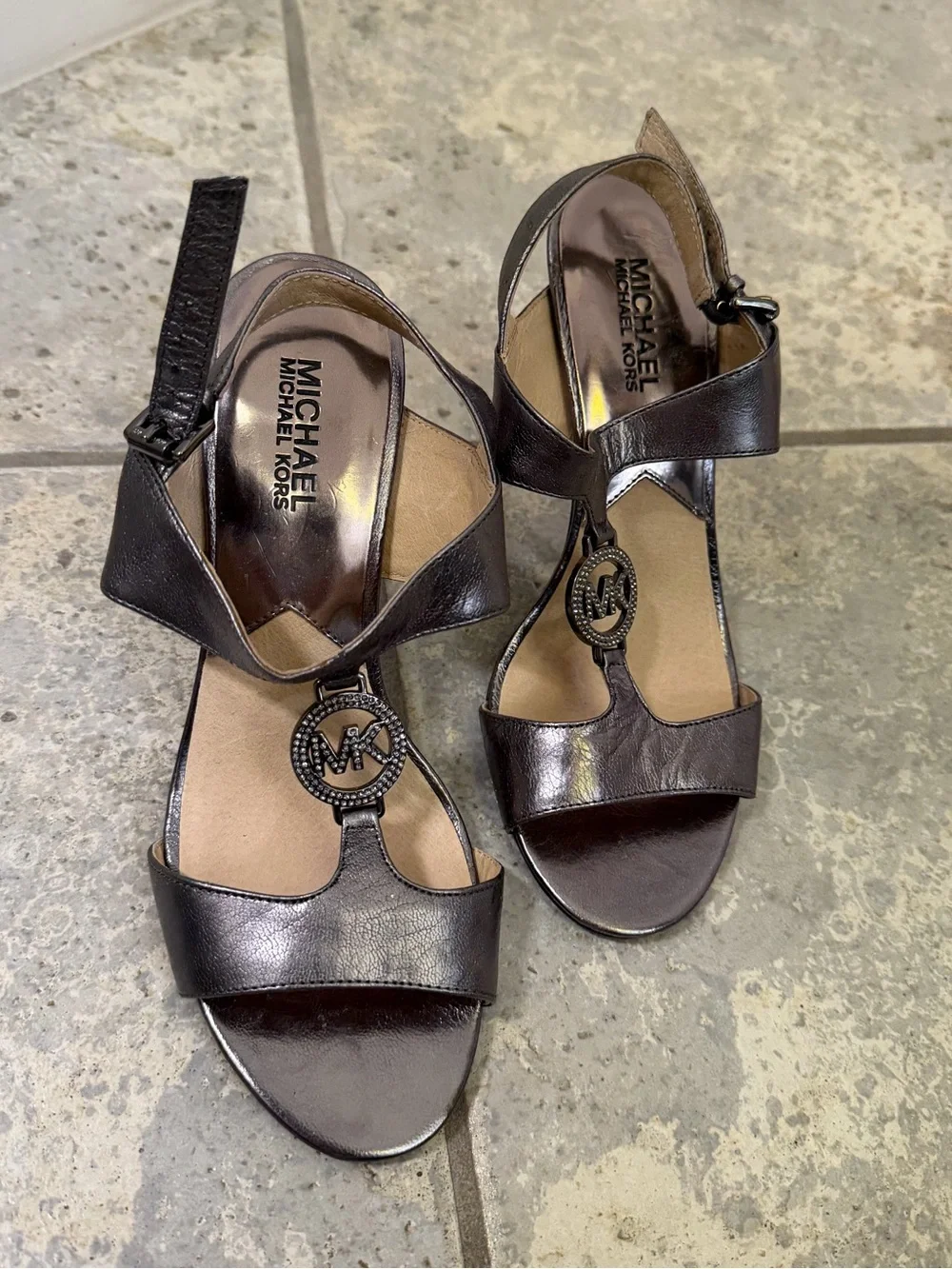 Michael Kors Shiny Silver Leather T-Strap Heels with MK Medallion Size 7.5